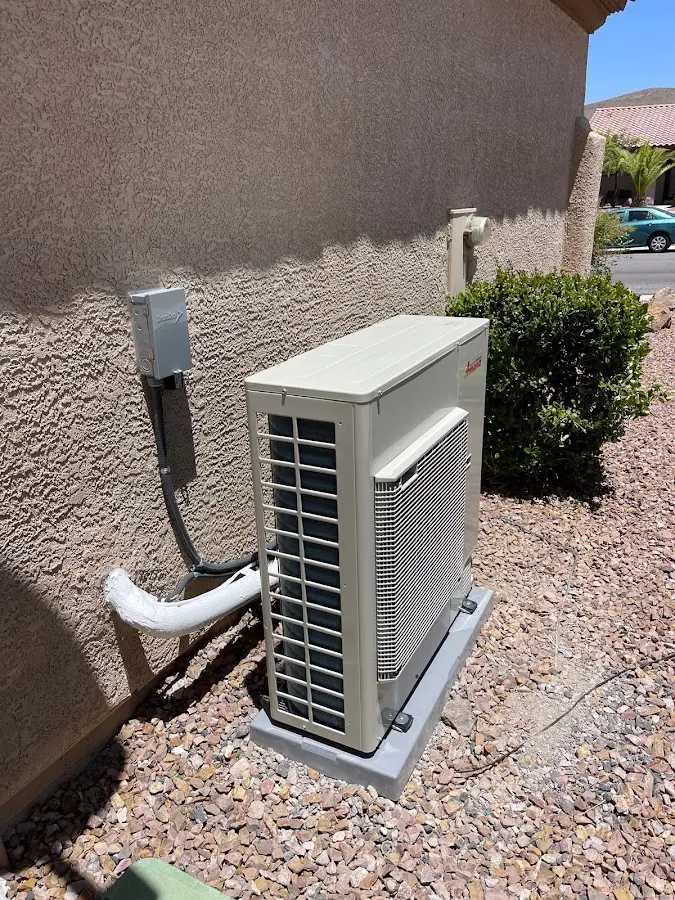 Residential air conditioning condenser unit in Pembroke